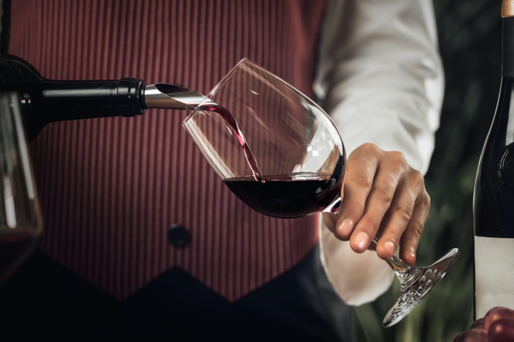 Red Wine Pouring Into Wine Glass