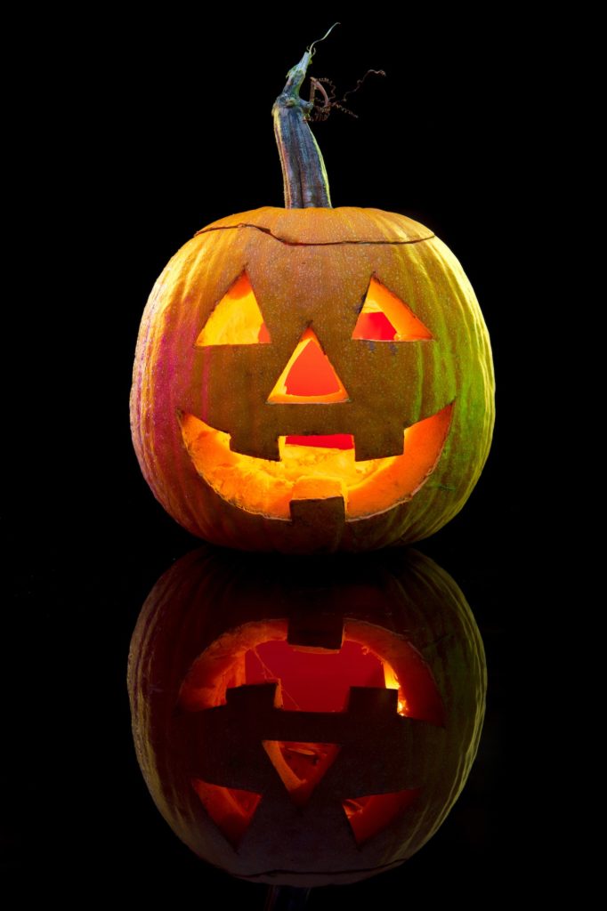 Halloween pumpkin head jack lantern with scary evil face