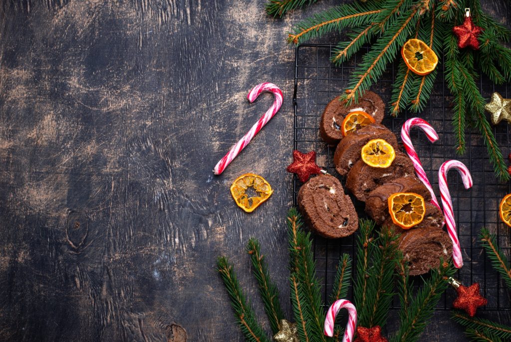 Christmas chocolate roll cake with cream
